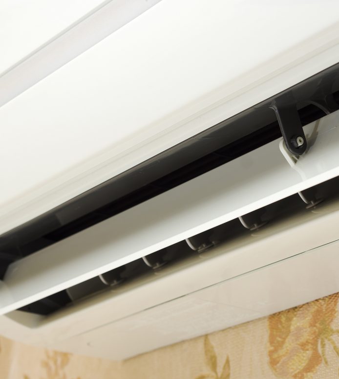 Close up of split system air conditioner in home interior